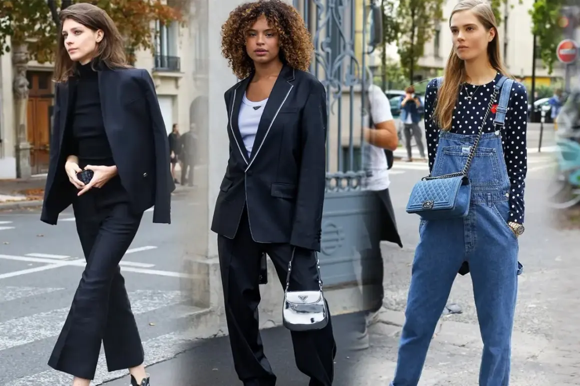 Tres mujeres exhiben su **street style** en la ciudad: una con traje negro, otra con blazer y pantalón, y la tercera con peto vaquero y top de lunares.