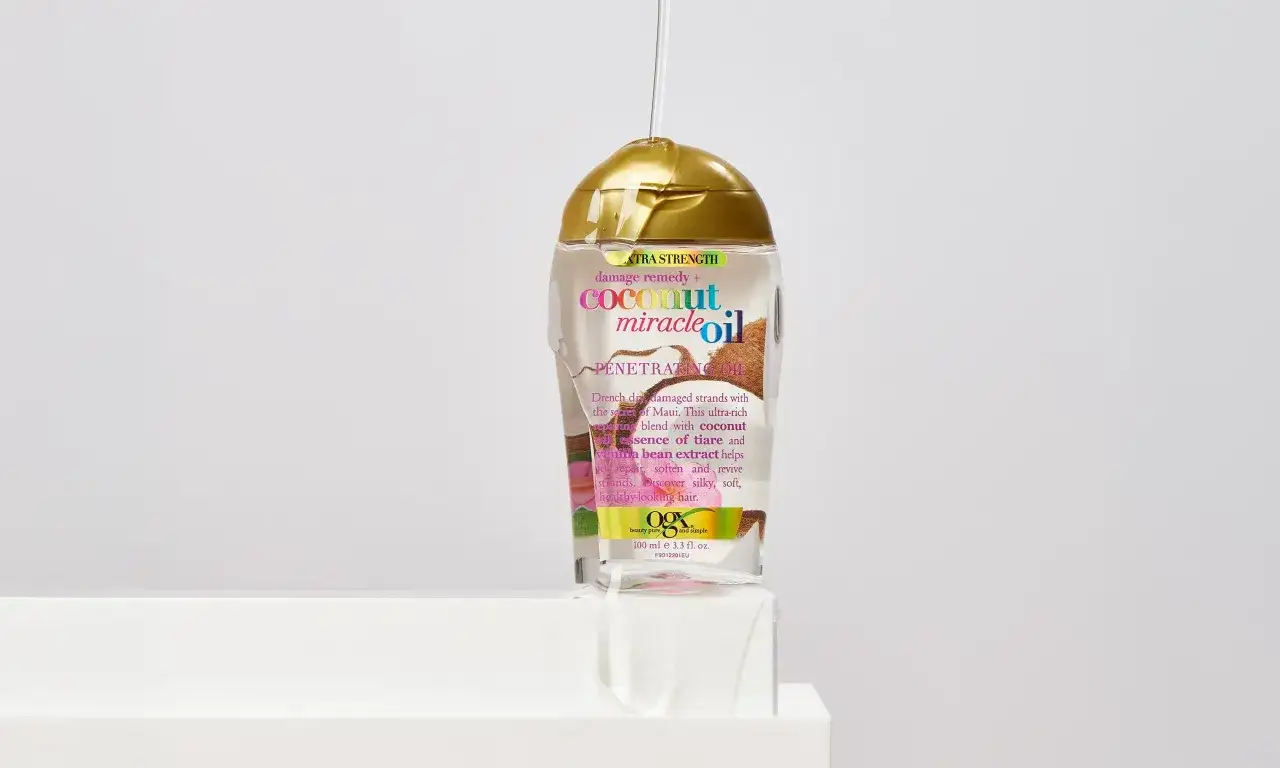 Aceite de coco para el pelo OGX Coconut Miracle Oil. Un elixir para reparar, suavizar y revivir el cabello dañado.